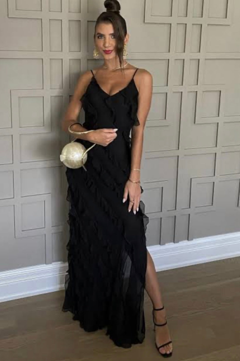 Rat & Boa Selena black dress with gold accessories.