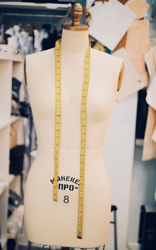 Dressmakers form with tape measure, ball dress alterations, Auckland