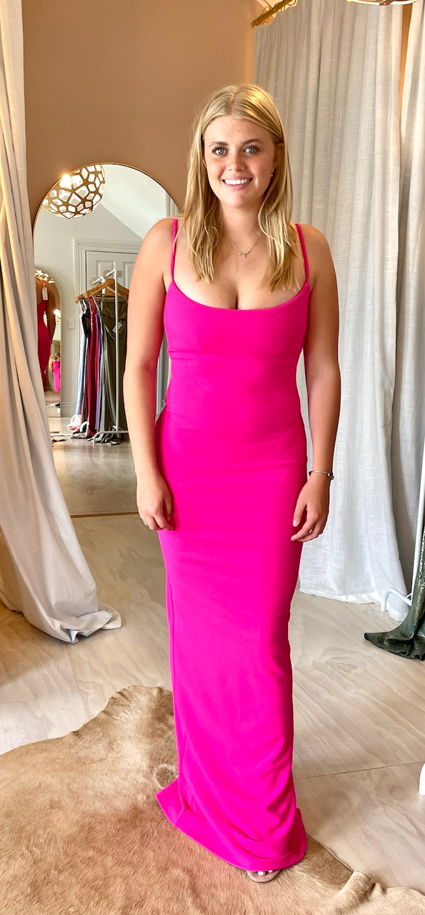 Nookie Bailey Gown in Neon Pink front view taken at The Social Wardrobe dress rental shop.