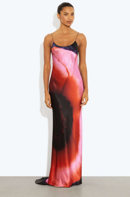 Rat & Boa Solaris Dress image shows woman wearing a long, colorful dress with a white background