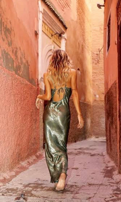 Rat & Boa Alessandra Slip Dress metallic back view, model walking down lane.