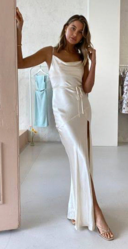 Shona Joy la Lune Bias Cowl Maxi Dress rental with leg split. Model standing in 