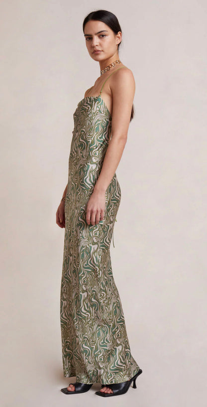Bec and Bridge Alanis Maxi dress in green silk fabric, side view with white background