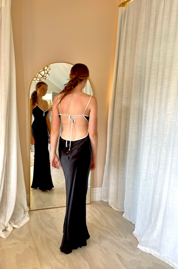 Bec and Bridge Cedar City Maxi Dress in Black with white edging back view showing low back and ties across. 