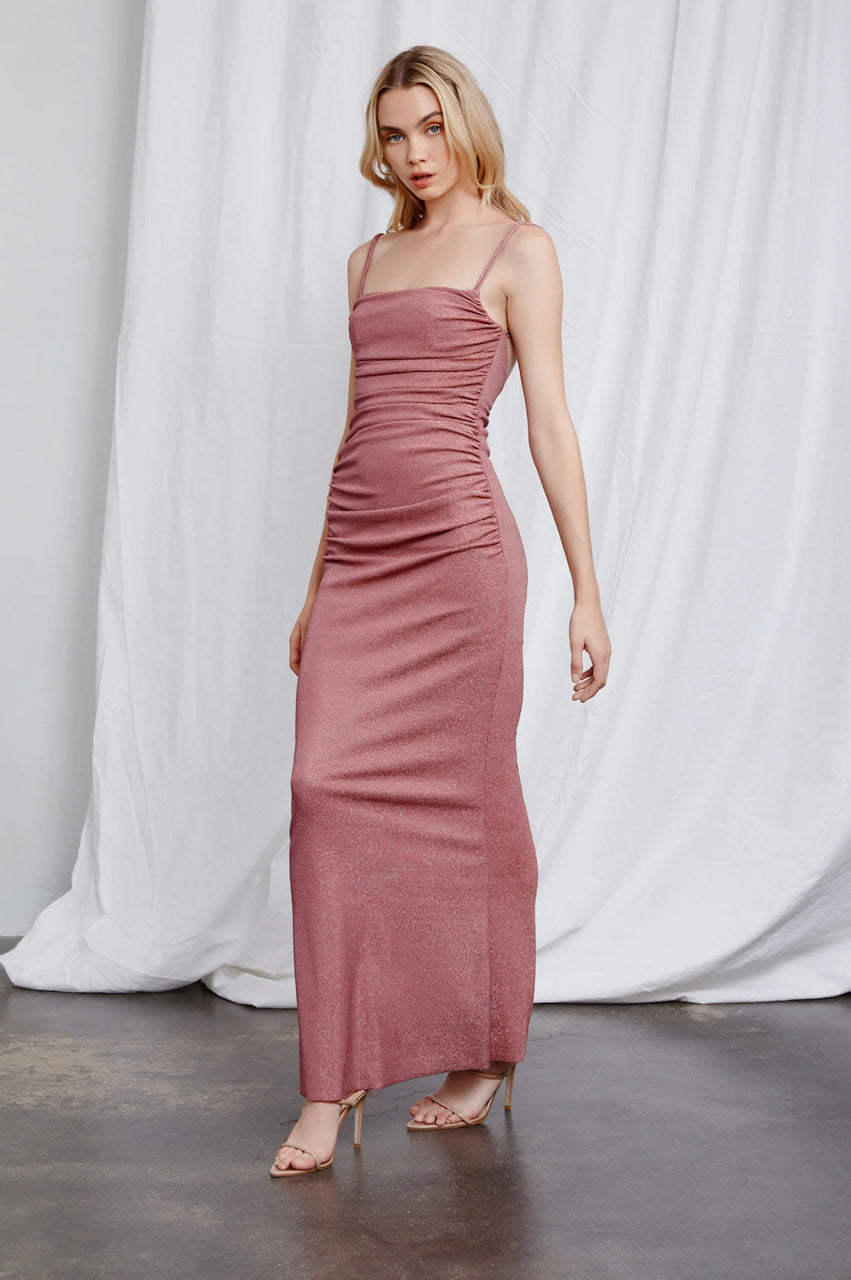 Lexi Dalma Dress in Rose side view with white curtain behind
